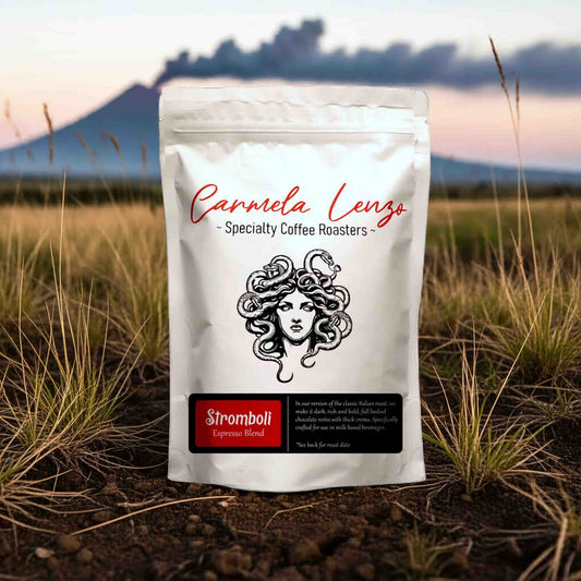 Carmela Lenzo coffee bag with a mountain and field background